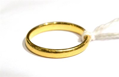 Lot 135 - A 22 carat gold court band ring, finger size N1/2, 3.6g
