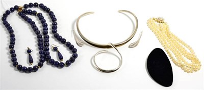 Lot 138 - A silver collar necklace, earring and bracelet suite, as leaf motifs; a lapis lazuli double...