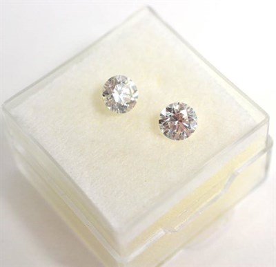 Lot 146 - Two loose round brilliant cut diamonds, weighing 0.56 carat and 0.54 carat, Colour: I, Clarity:...