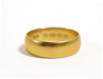 Lot 151 - A 22 carat gold band ring, finger size Q1/2
