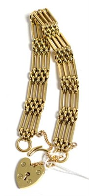 Lot 170 - A 9 carat gold gate link bracelet with padlock clasp, 29.8g