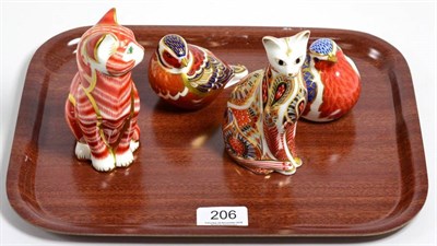 Lot 206 - Four Royal Crown Derby paperweights comprising two seated cats and two birds (each with gold...