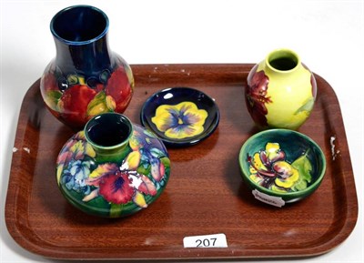 Lot 207 - A William Moorcroft Pomegranate pattern vase (restored); a Walter Moorcroft Orchid and Spring...