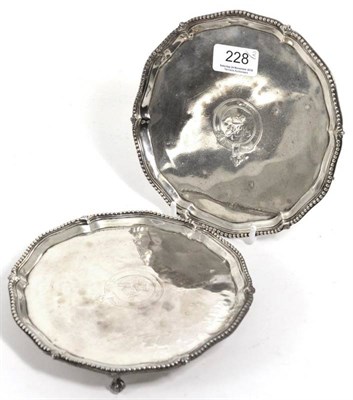 Lot 228 - A pair of George III silver salvers, Richard Rugg, London 1779, circular with bead border , o three