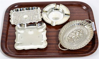 Lot 239 - A twin handled oval silver dish, Vale Brothers & Sermon, Birmingham 1890, decorated with fruit...