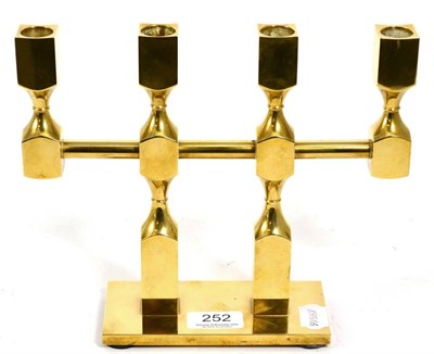 Lot 252 - A Swedish brass four light candelabra, Lars Bergsten for Gusum, dated 1983 and numbered 263