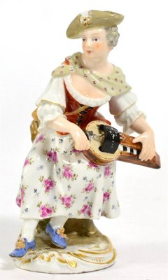 Lot 254 - A 19th century Meissen style figure of a musician (restored)