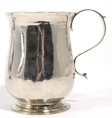 Lot 255 - An early George III silver mug, James Stamp & John Baker, London 1769, plain baluster with...