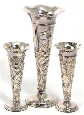 Lot 256 - A set of three silver posy vases, Comyns, London 1901