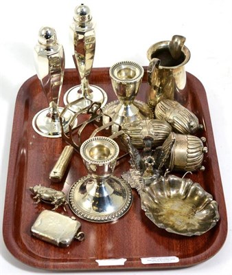 Lot 267 - Silver items to include pepper pots; candlesticks; toastrack; cream jug etc