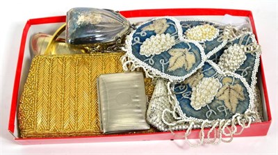 Lot 275 - Lady's fine white metal purses; two bead decorated purses; and a pair of beadwork wall pockets