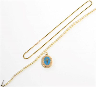 Lot 289 - An enamel and seed pearl locket, a rope link chain, 6.8g and a cultured pearl necklace with a paste