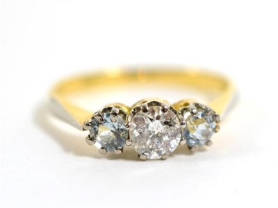 Lot 290 - A diamond and aquamarine three stone ring, an old cut diamond spaced by round cut aquamarine,...