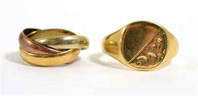 Lot 291 - A 9 carat gold signet ring, finger size W; and a Russian ring, finger size H1/2, 11.7g (2)