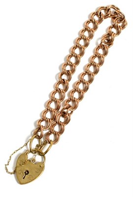 Lot 311 - A 9 carat gold double link bracelet with 9 carat gold padlock clasp, 13.4g