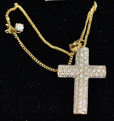 Lot 351 - A 9 carat gold diamond cross pendant, total estimated diamond weight 0.60 carat approximately,...