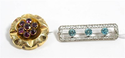 Lot 358 - An early twentieth century blue zircon brooch, measures 1cm by 4cm, stamped '14K', 3.7g and a...