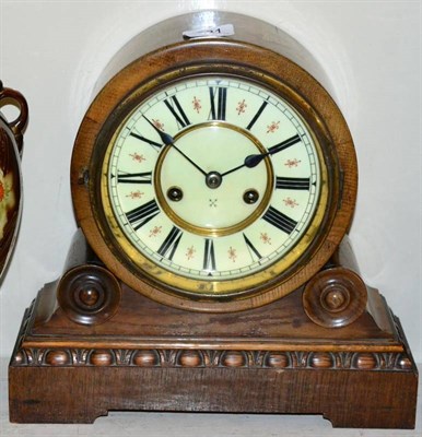 Lot 381 - An oak striking mantel clock