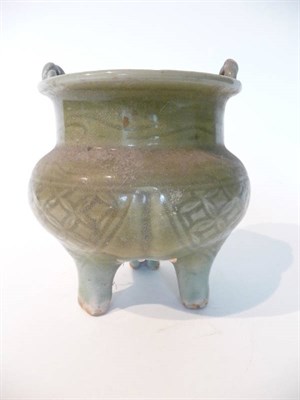 Lot 221 - A Longquan Celadon Tripod Censer, Ming Dynasty, of globular form with ropetwist handles, on...