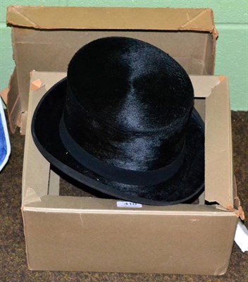 Lot 410 - An Edwardian black silk top hat by G A Dunn & Co, London in card box