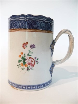 Lot 225 - A Chinese Porcelain Mug, circa 1780, of cylindrical form with ogee moulded rim and entwined...