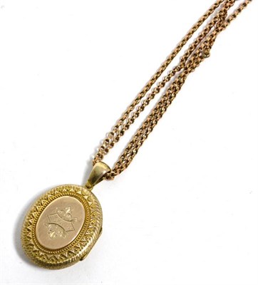 Lot 432 - A Victorian seed pearl set locket, on a guard chain, with clip, stamped '9CT', chain 21.6g