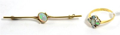 Lot 437 - An early twentieth century 18 carat gold opal cluster ring, finger size O1/2, 2.4g and an opal...