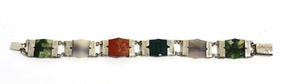 Lot 438 - A Scottish hardstone bracelet, of various hardstone plaque links, to chased mounts, length 18cm