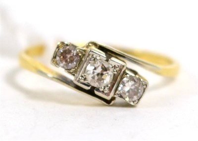 Lot 439 - An Art Deco diamond three stone ring, total estimated diamond weight 0.35 carat approximately,...