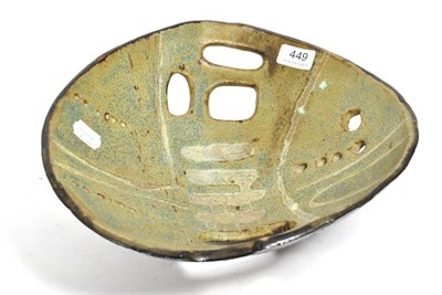 Lot 449 - Joe Tetteh (Ghanaian, 20th century): a reticulated studio pottery bowl, mottled glaze, incised...