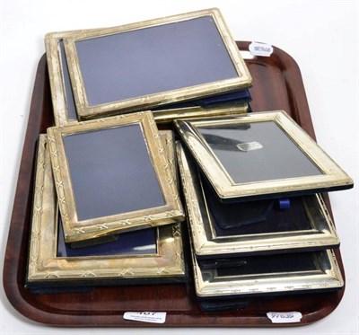 Lot 467 - A set of three silver photograph frames, two graduated silver photograph frames and a further...