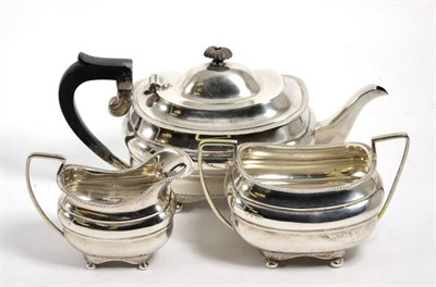 Lot 469 - A silver three piece teaset