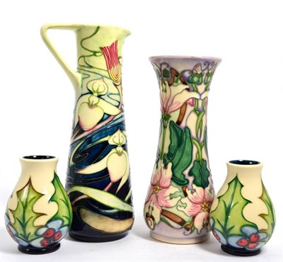 Lot 470 - A Moorcroft Orchid Arabesque pattern jug by Emma Bossons (second), a Moorcroft vase (second)...