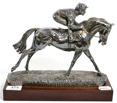 Lot 474 - A filled silver model of a horse and jockey, signed C. Gent