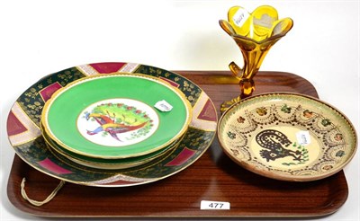 Lot 477 - A Vienna porcelain cabinet plate, two cabinet plates decorated with exotic birds, a Victorian amber