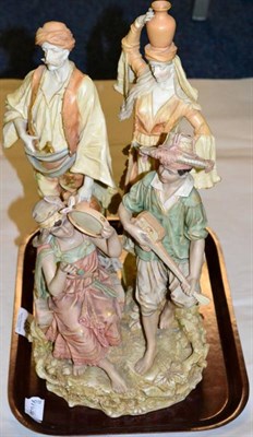 Lot 480 - A Royal Dux figure group of musicians and a pair of Austrian figures