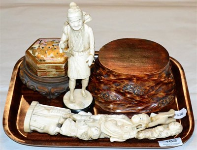 Lot 483 - A Japanese Meiji period carved ivory okimono of a fisherman and children and a further okimono of a