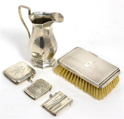 Lot 496 - Three silver vesta cases; a baluster cream jug Elkington & Co, Birmingham 1934; and an Art Deco...