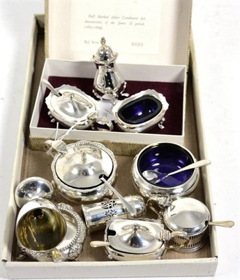 Lot 503 - A group of assorted silver condiments, comprising: two circular salts; three mustard pots; a...