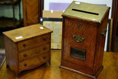 Lot 514 - An Edwardian oak letter box with brass plate, 41cm high; and a Georgian style mahogany...