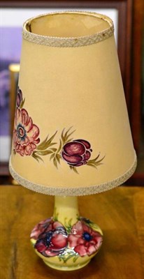 Lot 515 - A Walter Moorcroft Anemone table lamp with original painted shade