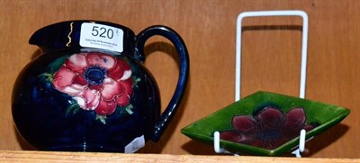 Lot 520 - A Moorcroft Anemone pattern jug together with a Moorcroft Anemone pattern dish (2)