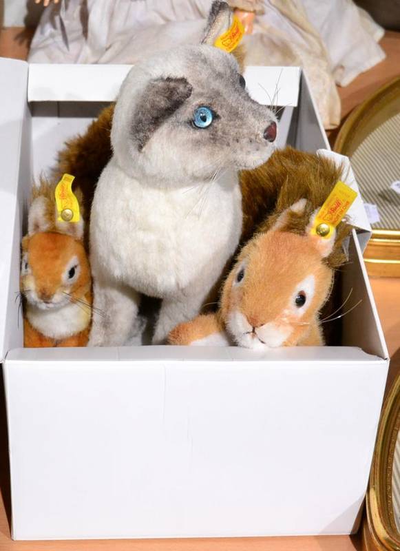 Lot 1001 - Steiff Siamese seated cat in original box, together with two Steiff squirrels (3)