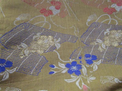 Lot 1011 - Assorted Chinese textiles and embroideries, including a brown silk brocade panel (a.f.), with...