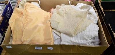 Lot 1023 - Assorted white cotton child and baby dresses and gowns, wool undergarments, pair of ladies...