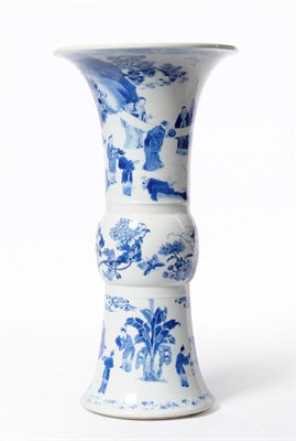 Lot 238 - A Chinese Porcelain Gu Shaped Vase, Kangxi period (1868-1912), painted in underglaze blue with...