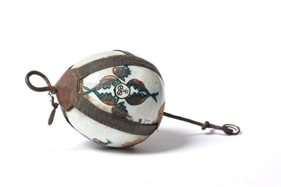 Lot 239 - A Kutaya Pottery Hanging Ornament, late 18th century, of egg shape, painted in black, brown and...