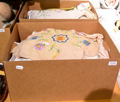 Lot 1048 - Assorted circa 1930s and later cotton and linen embroidered cloths, table linen etc (two boxes)