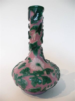 Lot 241 - A Peking Green and White Overlay Pink Glass Vase, 19th/20th century, carved with insects...