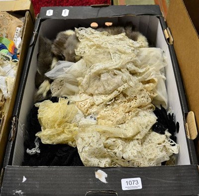 Lot 1073 - Assorted decorative lace and textiles and accessories, including a fur gilet with ermine tails...